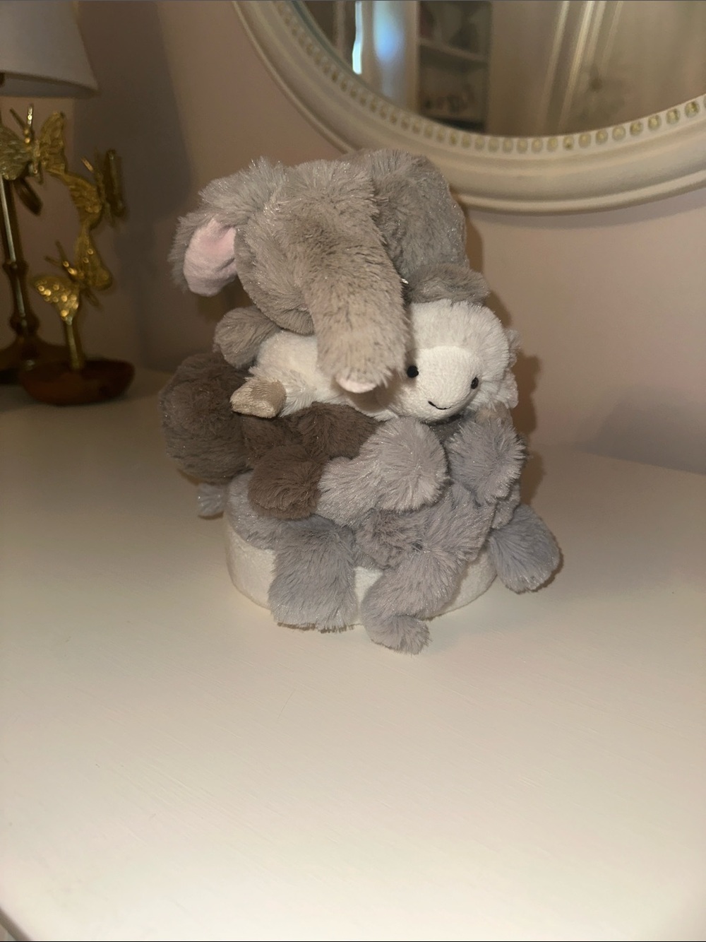 Stack of Soft Plush Animal Toys in Gray and Brown